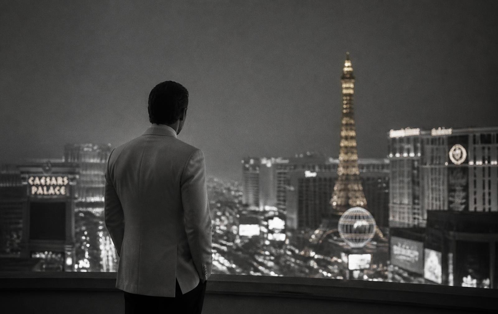 SmashLode in an ivory tuxedo jacket overlooking the Las Vegas strip at twilight